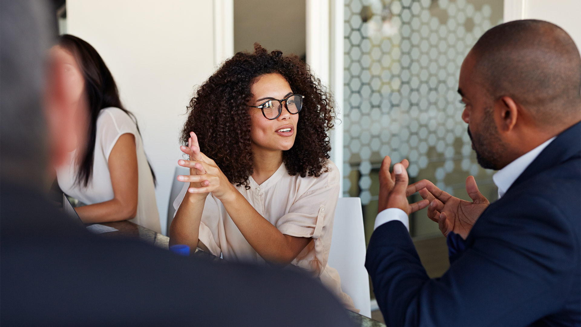 Group of male and female coworkers having a meeting
