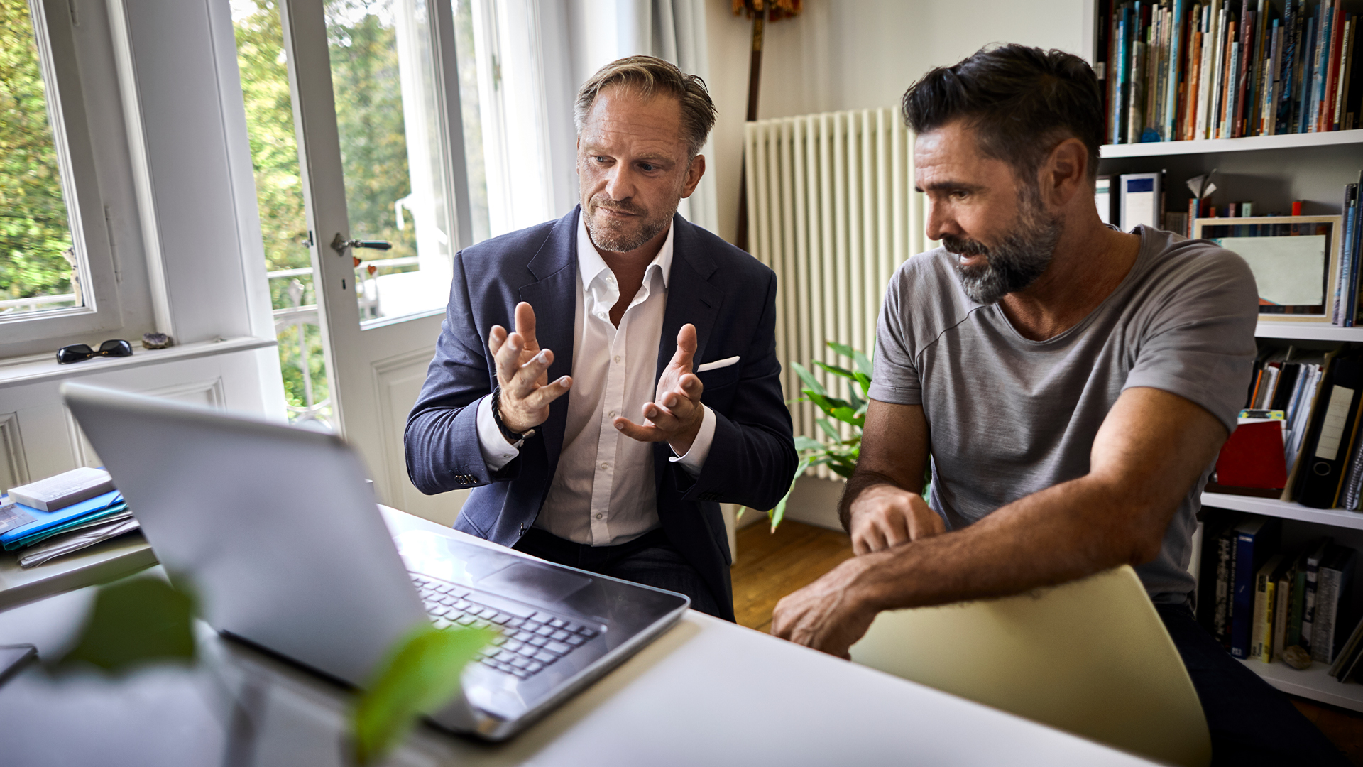 Financial advisor working with his client