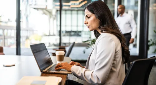 Professional woman working at her laptop