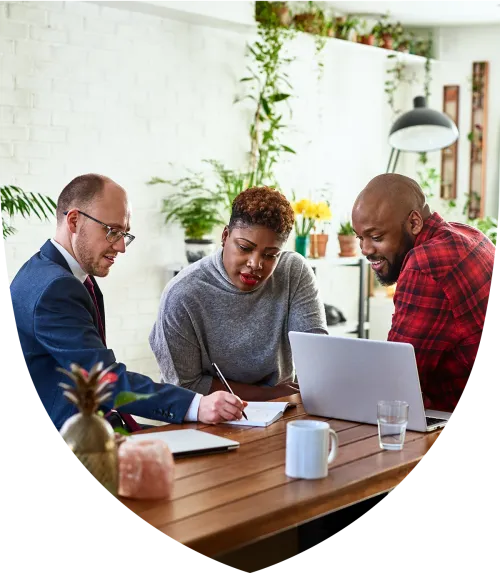 Married couple meeting with their advisor