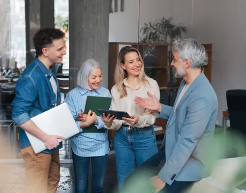 Group of coworkers talking together