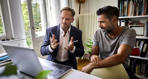 Financial advisor working with his client