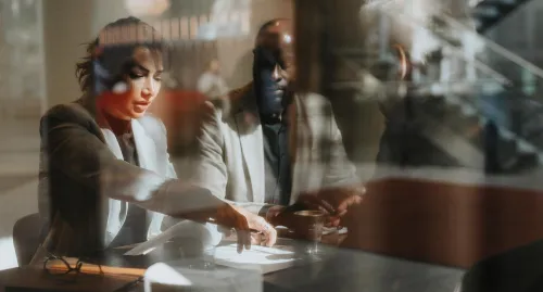 Financial advisor speaking with her client
